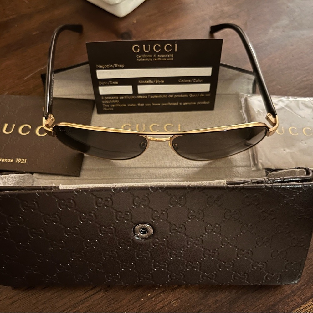 Gucci Black and Gold Sunglasses